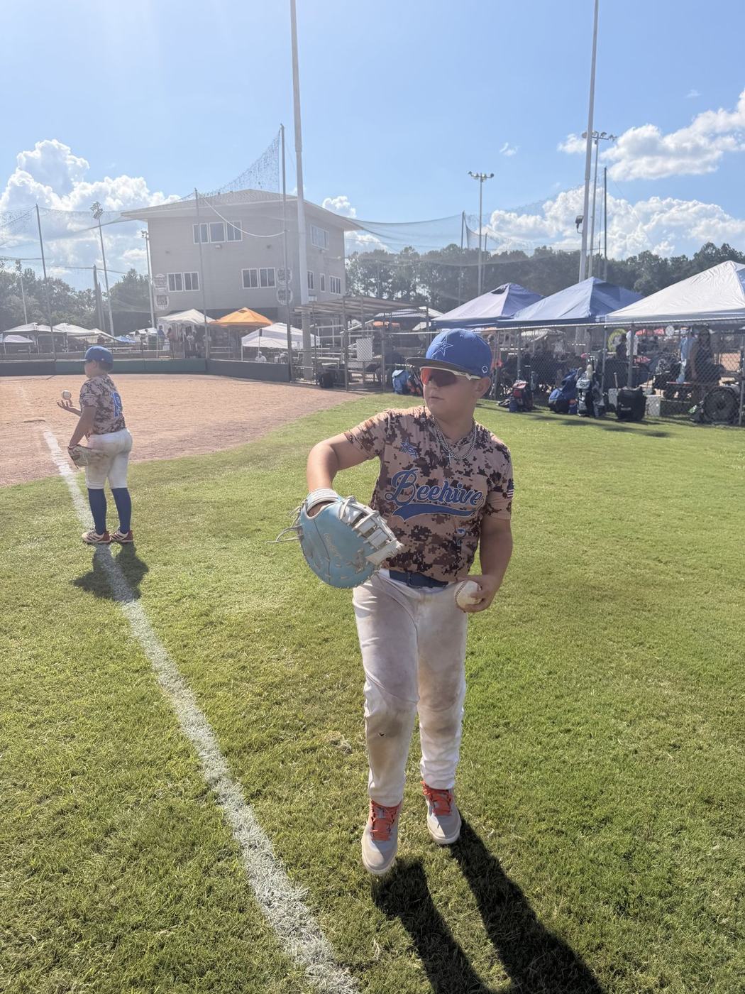 11U National player heading in from pre-game warm-ups