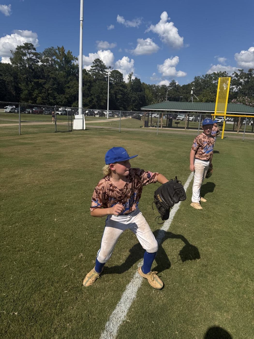 11U National players playing catch before the game