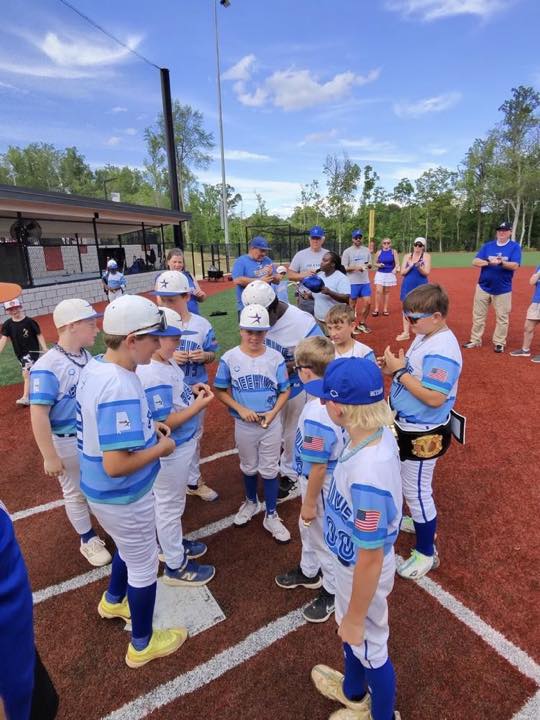 11U National team huddled before play